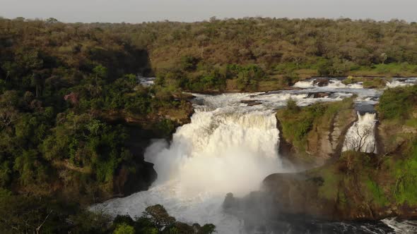Drone Shot Over the African River NIle and a Powerful Waterfall Zoom in Out
