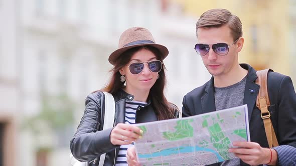 Happy Tourist Couple Traveling on Holidays in Europe Smiling Happy. Caucasian Couple alt