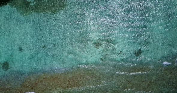 Wide angle fly over abstract view of a summer white paradise sand beach and aqua turquoise water bac alt