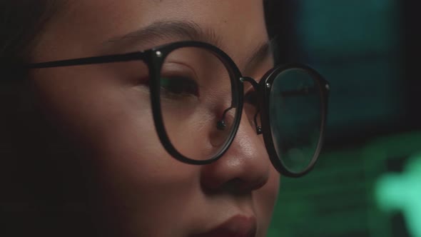 Asian Young Girl Hacker Hacking With Multiple Computer Screens In Dark Room alt