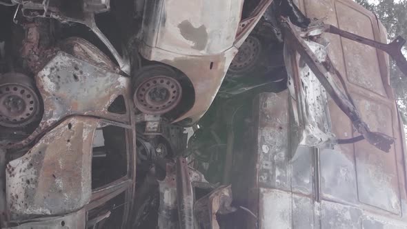 Vertical Video of a Dump of Wardestroyed Cars in Ukraine alt
