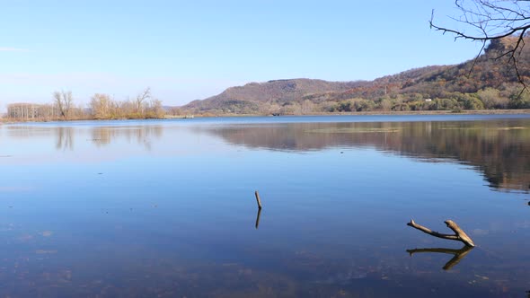 Water filled wetland in Wisconsin on a bright clear autumn day. Reflections in the water.