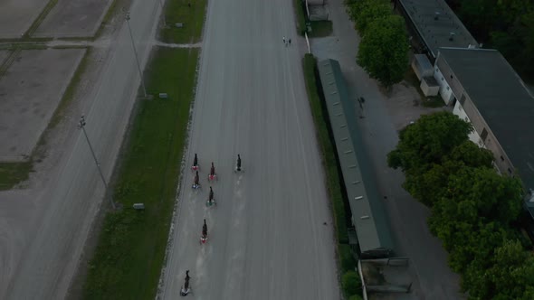 Horse Race with Harness Racers on Dirt Track, Aerial Birds Eye Overhead Top Down View alt