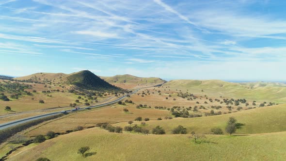 Highway and Hilly Rural Landscape. Kern County. California, USA. Aerial View alt