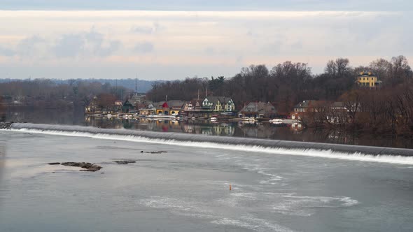Time lapse of Boathouse Row in Philadelphia along the Schuylkill River with colorful clouds and sky alt