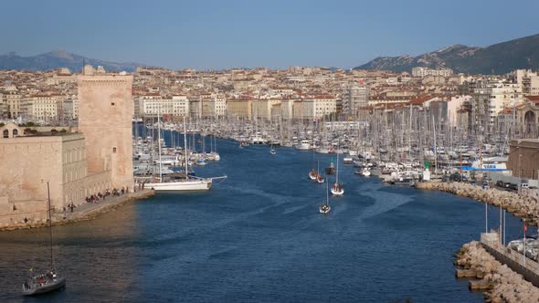 Yachts Coming To Marseille Old Port on Sunset. Marseille, France alt
