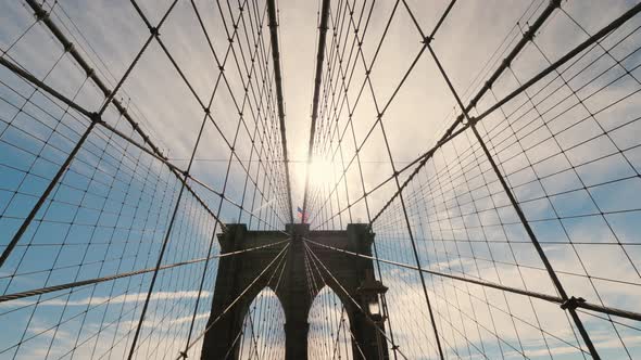 The Silhouette of the Pylons of the Brooklyn Bridge, a Lot of Ropes Hold the Canvas of the Bridge alt