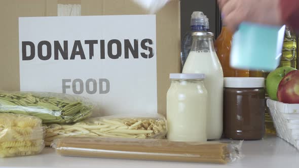 protective respirator mask and sanitizer near Food groceries and Donation