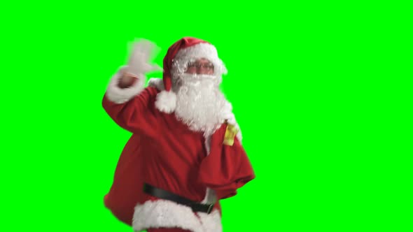 Merry Christmas. Dancing Santa Claus In Full Growth In Red Suit