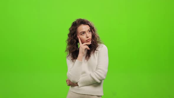 The Woman is Standing and Thinking alt