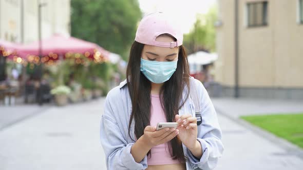 Asian woman wearing medical mask.