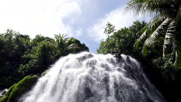 A closeup of the beautiful Kepirohi Waterfall in Pohnpei on the remote tropical island in Federated alt
