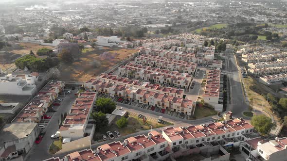 4k Flying forward and backward over residential area in at Alta California, Mexico alt
