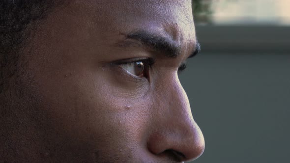 Discomforted Black Businessman Sitting Alone Deep in His Problems: Failure alt