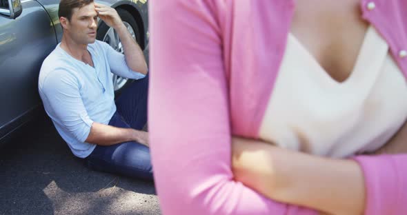Couple ignoring each other near car alt