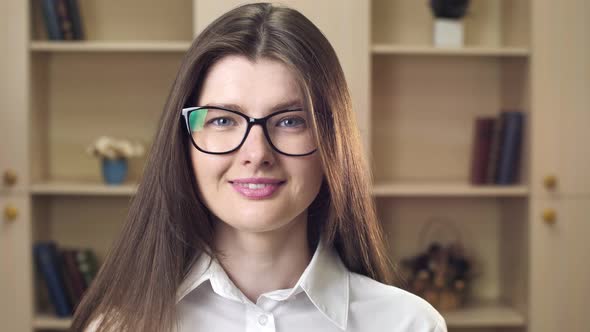 Beautiful Smiling Confident Young Woman Beautiful Face Looking at Camera Posing Alone at Home in alt