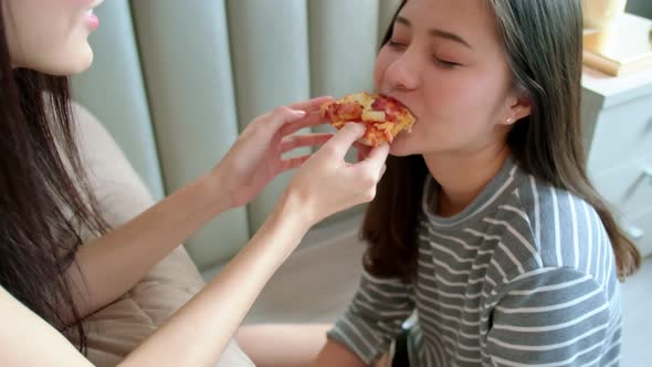 Asian lgbt lesbian couple lying on bedroom.LGBT freedom, bonding alt