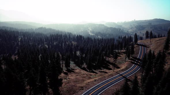 Aerial View of the Old Road Going Through Pass in the Swiss Alps alt