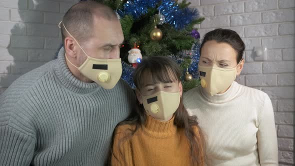 Upset Family in Mask at Christmas alt
