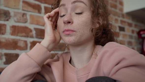 Close up video of young sad caucasian woman using mobile phone. Shot with RED helium camera in 8K. alt