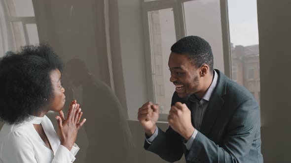 Happy Excited Young African American Office Workers Receive Special Commercial Offer Fantastic News alt