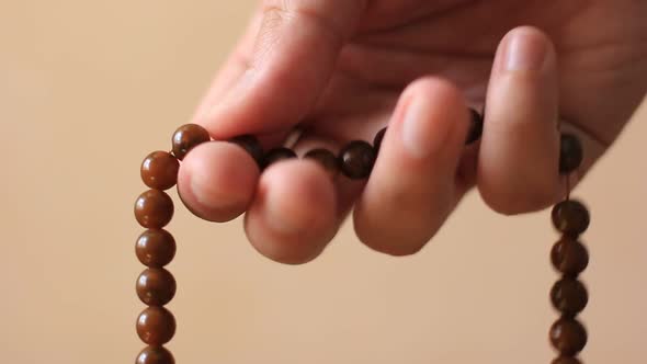 Prayer Beads In Hand