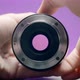 Close-up of man rotating lens - VideoHive Item for Sale