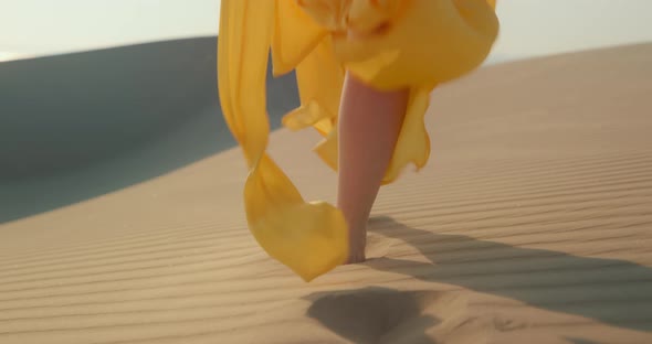 Close Up Cinematic Slow Motion of Woman Walking By the Sand with Wavy Pattern alt