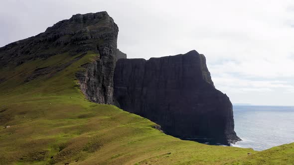 Part of a Series Aerial View of Famous Cliff in Faroe Islands alt