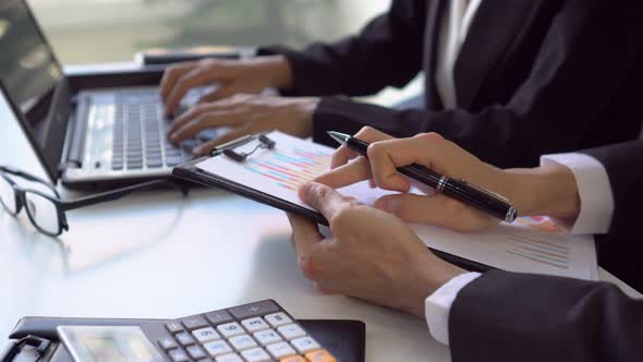 Business people working on Desk office with marketing graph statistics analysis alt