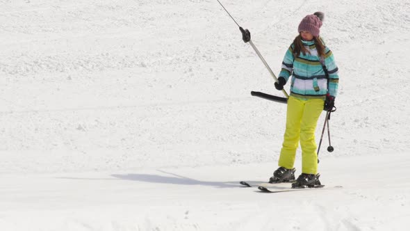 Amateur Skier Girl on a Lift alt