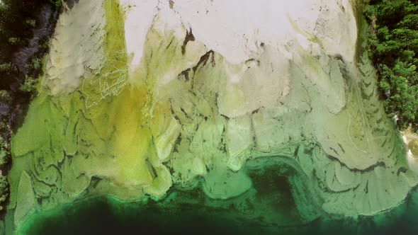 Aerial view of abstract green and transparent water in Lago del Predil, tally. alt
