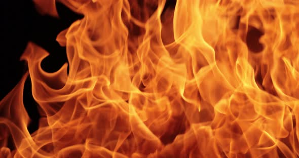 Flames of Fire on Black Background in Slow Motion alt