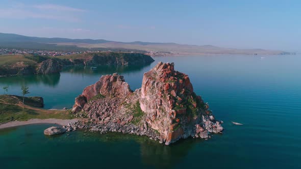 Aerial Drone Footage. Summer. Lake Baikal. Olkhon Island. Rocks in the Siberia. Cape Burkhan alt