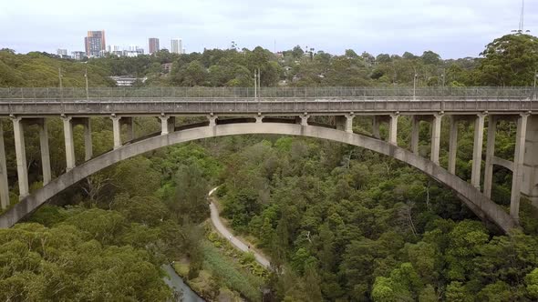 Side view of Long Gully Suspension Bridge with traffic in Northbridge area of Sydney, Australia, Aer alt