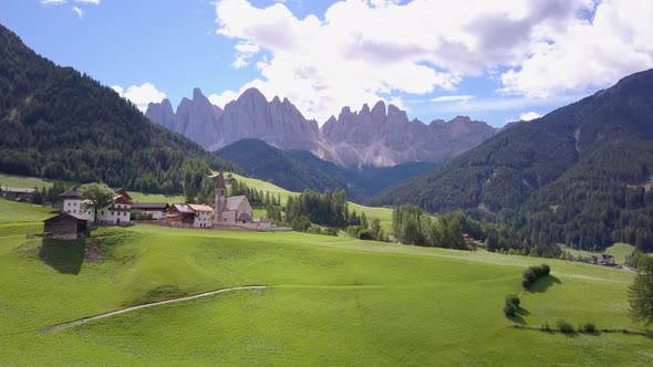 Aerial travel drone view of South Tyrol, Italy and the Dolomites mountains. alt