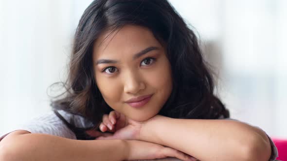 Closeup Portrait of Pretty Asian Young Woman with Perfect Clear Skin and Natural Makeup alt