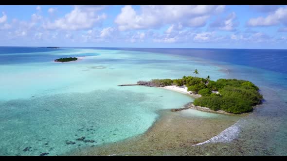 Aerial flying over abstract of beautiful resort beach voyage by transparent lagoon and white sandy b alt