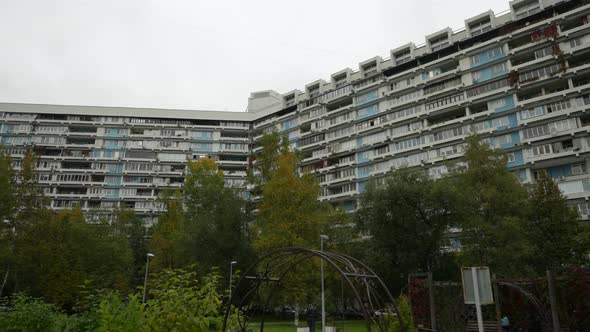 Highrise Residential Building and Autumn Landscape