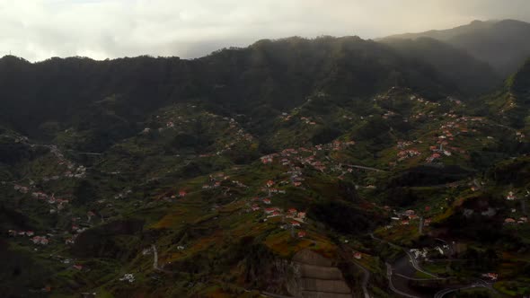 Madeira nature view with ocean cliffs and small villages alt