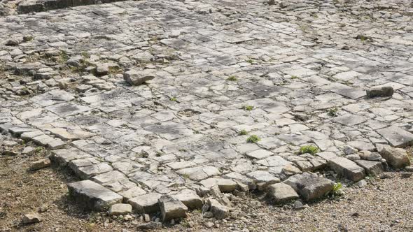 Medieval castle  stone-floor  ruins of stone and plaste slow-tilt 4K 2160p 30fps UltraHD footage - T alt