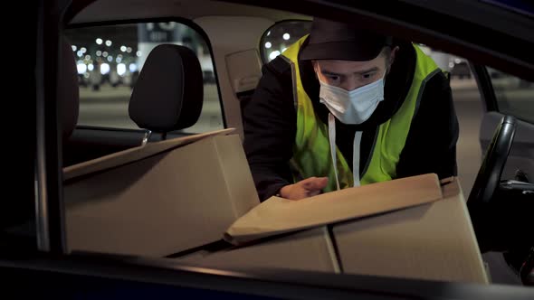 Delivery Service Man Wearing His Protective Mask alt