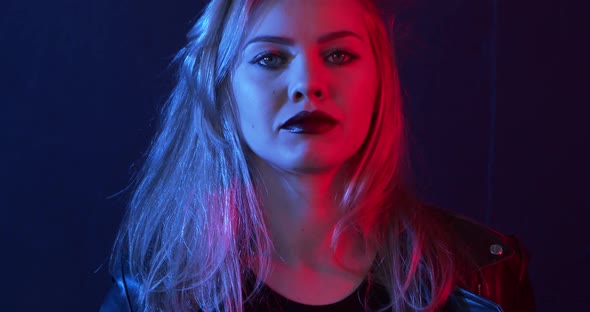 Hard Rock Stylish Beautiful Sexy Woman Posing Isolated on Black alt