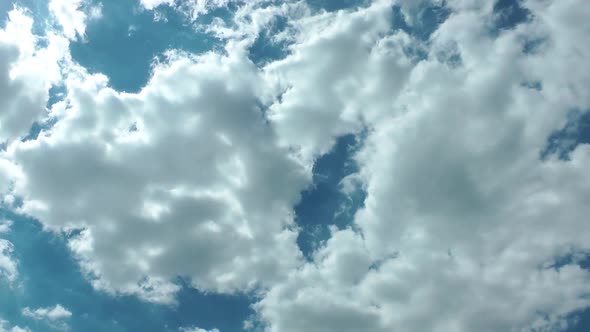 Cumulus Rain Clouds In Blue Sky alt