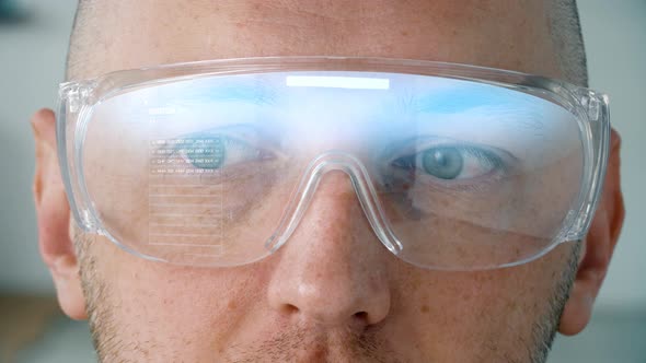 Close Up of Man in Smart Glasses with Coding 85 alt