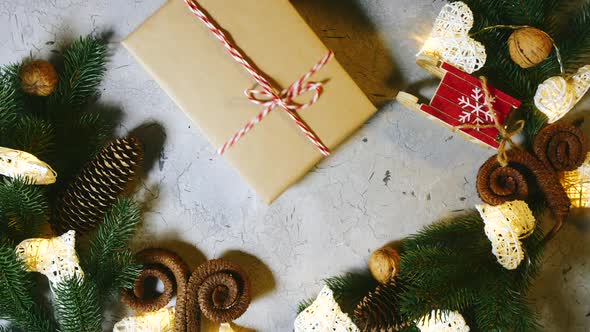 Good Winter Mood Awaiting Christmas. Human Hands Put a Christmas Present To the Rest of the alt