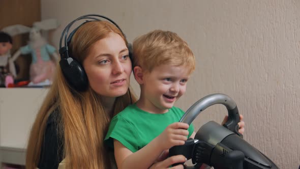 Cute Family Playing On The Computer alt