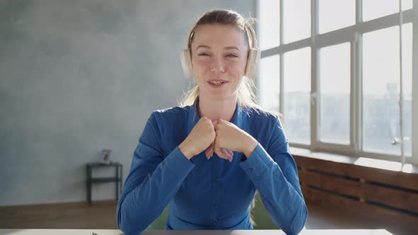 Cheerful Woman Wear Headset Laugh Using Laptop Video Stream Conference Call Teach Online, Happy Girl alt