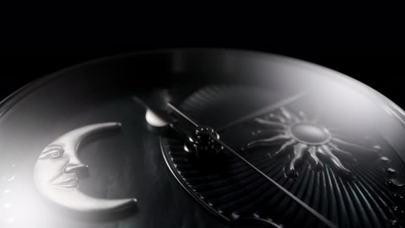 Rotating Swiss Watch with Moon and Sun Closeup alt