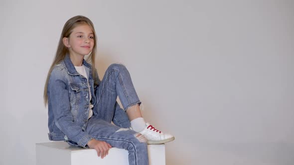 Cute Child Posing in the Photo Studio